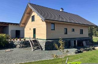 Haus kaufen in 7534 Olbendorf, Skandinavisches Blockhaus mit Galerie, Kamin und großem Grundstück mit Fernblick