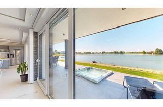 Einfamilienhaus kaufen in 7111 Parndorf, Ein Zuhause am Wasser – wo jeder Tag wie Urlaub beginnt!