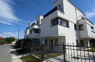 Reihenhaus kaufen in Greinzgasse 38, 1220 Wien, Modernes Reihenhaus mit 3 Etagen, Balkon und Einbauküche - wählen Sie eines von drei Häusern