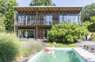 Einfamilienhaus kaufen in 3031 Pressbaum, Natur trifft Moderne: Traumhaus mit prachtvollem Garten, Pool und nachhaltiger Ausstattung in Rekawinkel