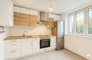 Wohnung kaufen in 1110 Wien, Charmante Wohnung mit Blick auf die Kirche – generalsanierte Anlage in Toplage von Simmering