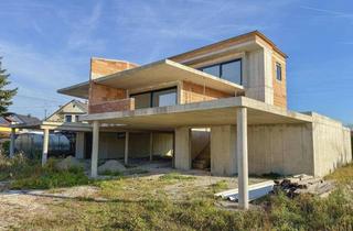 Haus kaufen in 4052 Ansfelden, Zwei Einheiten, eine Vision - moderne Architektur in Rohform