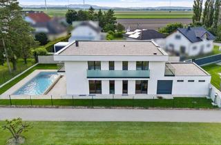 Villen zu kaufen in 1220 Wien, Werbepreis bis Ende 2025: Großzügige Villa mit Infinity-Pool