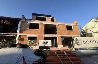 Wohnung kaufen in 2460 Bruck an der Leitha, Erstbezug! Traumhafte, gut gelegene Wohnung mit Garten und Terrasse in Bruck an der Leitha