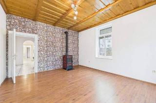 Wohnung kaufen in 2460 Bruck an der Leitha, Geräumige Erdgeschosswohnung mit vielseitigen Nutzungsmöglichkeiten