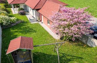 Haus kaufen in 4052 Ansfelden, Leistbarer Traum-Bungalow mit Kachelofen überdachter Terrasse, Gartenoase, Wohnkeller und Doppelgarage im Laahfeld /Ansfelden