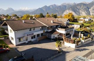 Gewerbeimmobilie kaufen in 6094 Axams, Liegenschaft mit Wohnungen- und Gewerbeeinheiten