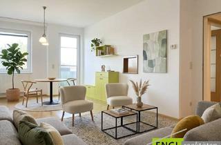 Wohnung kaufen in 2460 Bruck an der Leitha, Lichtdurchflutete Wohnung mit Balkon und Grünblick