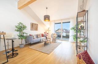 Wohnung kaufen in 5202 Neumarkt am Wallersee, Stilvolle Dachgeschosswohnung mit Dachterrasse und Weitblick in Neumarkt am Wallersee