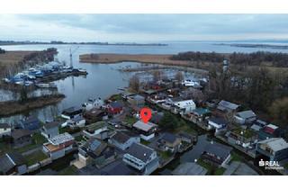 Immobilie kaufen in 6971 Hard, Ferienhaus am Bodensee - Wohnen direkt am Wasser mit Bootsgarage