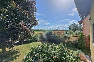 Haus kaufen in Wiener Neustadt (Akedemie-Park), Frohsdorfer-Siedlung, 2700 Katzelsdorf, Sonniges Familienhaus - Raumwunder - Nähe Wiener Neustadt in Katzelsdorf - mit schönen Garten, Keller und Garage