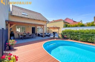 Einfamilienhaus kaufen in 2481 Achau, Zeit für schöne Tage: saniertes Haus in Achau mit Pooldeck, Garten & Nebengebäude