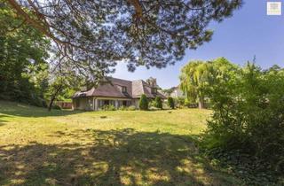 Villen zu kaufen in 2380 Perchtoldsdorf, Charmante Stil-Villa mit einzigartigem Potenzial eingebettet in eine 6.000 m² große Parklandschaft
