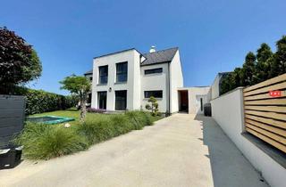 Einfamilienhaus kaufen in 2301 Rutzendorf, Modernes 186 m² Einfamilienhaus mit Wärmepumpe, Pool, Terrasse & Whirlpool