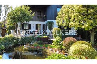 Einfamilienhaus kaufen in 2122 Ulrichskirchen, Exklusives Wohlfühlanwesen in Ulrichskirchen: 5 Zimmer, Gartenblick & Kamin, Sauna und Jacuzzi – hochwertig modernisiert, mit Garage und Vollkeller, nahe Wien im Weinviertel