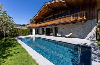 Maisonette kaufen in 6370 Reith bei Kitzbühel, Traumhafte Gartenwohnung mit eigenem Outdoor-Pool