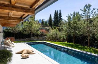 Maisonette kaufen in 6370 Reith bei Kitzbühel, Traumhafte Gartenwohnung mit eigenem Outdoor-Pool