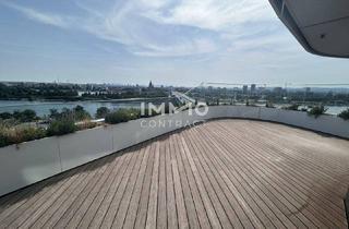 Wohnung kaufen in Wagramer Straße, 1220 Wien, Großzügige 4 Zimmer Wohnung mit über 100 m² Balkon und Blick auf die Donau!
