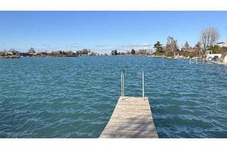 Villen zu kaufen in 2482 Münchendorf, 2482 Münchendorf | Moderne SEEVILLA ca. 128 m² | Direkter Seezugang am türkisblauen, paradiesischen Dürrsee