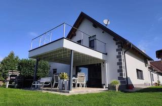 Haus kaufen in 8382 Mogersdorf, Exklusives Wohnensemble im sonnigen Südburgenland: Zwei Wohneinheiten auf über 3.500 m² Grund