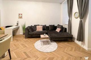 Wohnung kaufen in 1050 Wien, Moderne 2-Zimmer-Altbauwohnung mit Terrasse im ruhigen Innenhof