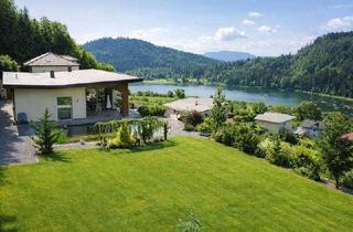 Villen zu kaufen in 9554 Sankt Urban, Moderne Seeblick-Villa mit Schwimmteich in Bestlage am St. Urbaner See