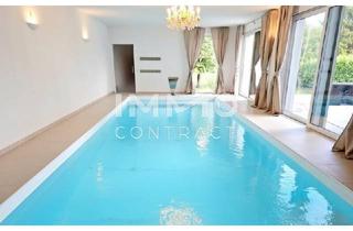 Villen zu kaufen in 2511 Pfaffstätten, Zeitlose Architektur trifft Großzügigkeit - Designvilla mit Indoor-Pool und Einliegeroption
