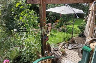 Wohnung kaufen in 5202 Neumarkt am Wallersee, IDEAL FÜR PÄRCHEN - Gartenidylle mit Garage und Carport!