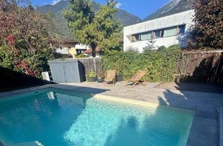 Einfamilienhaus kaufen in 6170 Zirl, Wohnen auf einer Ebene westlich von Innsbruck - sanierter Bungalow mit Pool, Infrarot, Garten und Privatsphäre