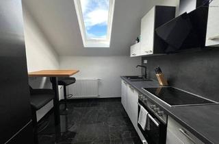 Wohnung kaufen in 2860 Kirchschlag in der Buckligen Welt, Modernisierte Dachgeschosswohnung mit Balkon & Blick auf die Burgruine Kirchschlag