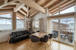 Wohnung kaufen in 6391 Fieberbrunn, Alpine Dachgeschosswohnung mit Sichtdachstuhl & Balkon - mitten in Fieberbrunn