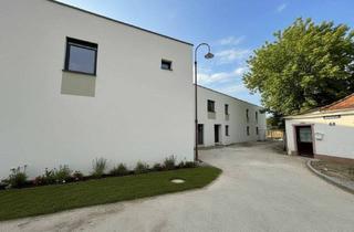 Wohnung kaufen in 2402 Haslau an der Donau, PROVISIONSFREIER ERSTBEZUG! Kompaktes Raumwunder mit Garten, Terrasse und 1 PKW-Stellplatz! Perfekte Anbindung nach Wien/Flughafen!