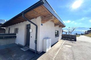 Wohnung kaufen in 6134 Fiecht, Stilvolle 2-Zimmer-Wohnung mit Westterrasse und kleinem Garten - wie ein kleiner Bungalow
