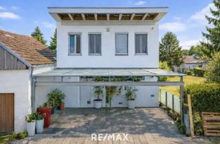 Villen zu kaufen in 2100 Korneuburg, Moderne Atriumvilla 20 Min. von Wien, Sommerküche, Edelstahl-Pool, pflegeleichter Garten