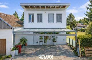 Villen zu kaufen in 2100 Korneuburg, Moderne Atriumvilla 20 Min. von Wien, Sommerküche, Edelstahl-Pool, pflegeleichter Garten