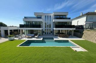 Villen zu kaufen in 2202 Königsbrunn im Weinviertel, Luxusvilla nahe Wien – 406 m² Wohnfläche | Pool | Wellness | Aufzug | Weinbergblick