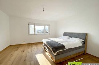 Wohnung kaufen in 2326 Maria-Lanzendorf, Hochwertig renovierte 3 Zimmerwohnung im modernen Design inclusive KFZ Stellplatz und attraktivem Gemeinschaftsgarten