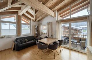 Wohnung kaufen in 6391 Fieberbrunn, Alpine Dachgeschosswohnung mit Sichtdachstuhl & Balkon – mitten in Fieberbrunn
