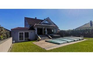 Haus kaufen in 2443 Leithaprodersdorf, MODERNE ELEGANZ - GROSSZÜGIGER FAMILIENHIT MIT POOL UND POOLHAUS