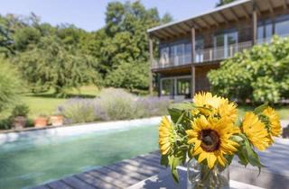 Einfamilienhaus kaufen in 3031 Pressbaum, Natur trifft Moderne: Traumhaus mit prachtvollem Garten, Pool und nachhaltiger Ausstattung in Rekawinkel