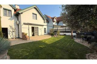 Einfamilienhaus kaufen in 2460 Bruck an der Leitha, Mediterranes Flair trifft modernes Familienhaus