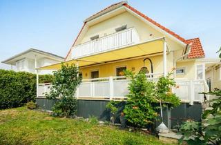 Einfamilienhaus kaufen in 2485 Wampersdorf, Urlaubsfeeling inklusive! Modernes Einfamilienhaus mit Balkon, Terrasse und Garten in Gated Community mit idyllischem Badesee
