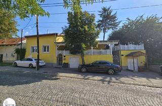 Einfamilienhaus kaufen in 1210 Wien, Exklusives Einfamilienhaus mit beheizbarem Weinkeller – Wohnen mit Stil und Komfort