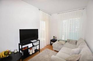 Wohnung kaufen in 8053 Graz, Top vermietete Anlegerwohnung mit Balkon und Tiefgarage - Neuwertig!