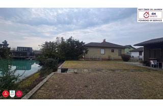 Grundstück zu kaufen in 2434 Götzendorf an der Leitha, Seegrundstück mit eigenem Steg - machen Sie es zu Ihrem Wohntraum! (aktuell mit kleinem Gartenhäuschen)