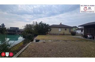 Grundstück zu kaufen in 2434 Götzendorf an der Leitha, Seegrundstück mit eigenem Steg - machen Sie es zu Ihrem Wohntraum! (aktuell mit kleinem Gartenhäuschen)