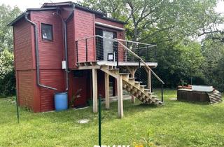 Haus kaufen in 3400 Klosterneuburg, Idyllisches Sommerhaus auf 349m² Pachtgrund in der Schwarzen Au - Ihre private Grünoase!