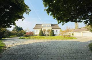 Villen zu kaufen in 2423 Deutsch Jahrndorf, Zeitlose Eleganz - Villa mit Parkgarten und Nebengebäuden