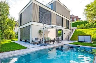 Villen zu kaufen in 2380 Perchtoldsdorf, Exklusives Wohnen vor den Toren Wiens!Moderne Villa mit Panorama-Dachterrasse