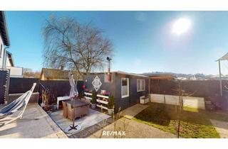 Wohnung kaufen in 4651 Stadl-Traun, Exklusive Gartenwohnung mit Pool, Kamin und Carport – Wohnen in ruhiger Lage!